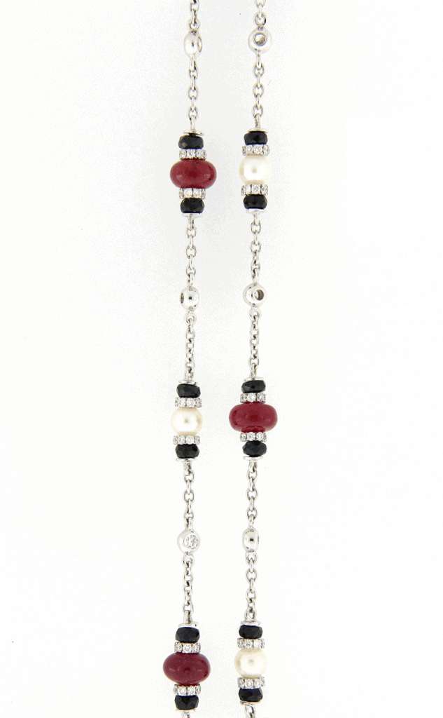 long chain set with diamonds, onyx, RUBIES AND PEARLS